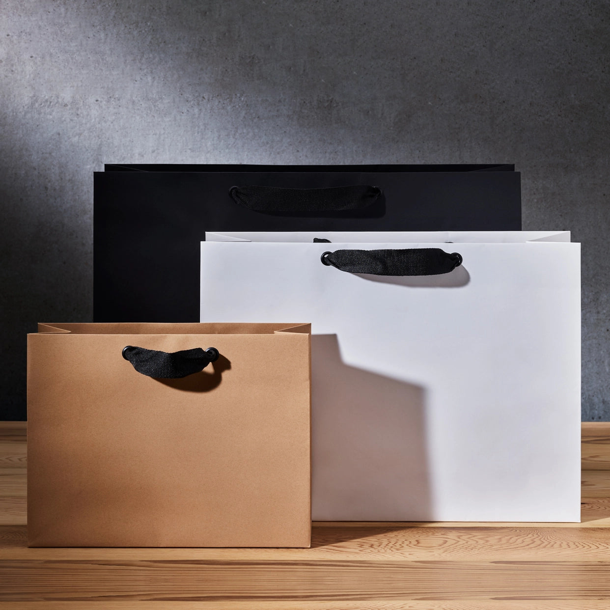 Luxe kraft papieren draagtas met zwarte linten