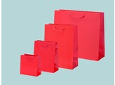 Sacs en papier de luxe brillants en rouge