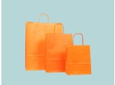 Orange paper bags with twisted paper handle