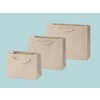 Luxury paper bags covered with cream coloured suede