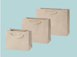 Luxury paper bags covered with cream coloured suede