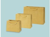 Luxury paper bags covered with ocher yellow suede